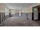 Spacious living room featuring natural light from windows and a minimalist aesthetic at 710 Fox St, Longboat Key, FL 34228