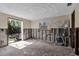 Renovation-ready living area with a sliding door and ample natural light from a nearby window at 710 Fox St, Longboat Key, FL 34228