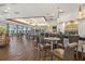 Stylish bar area with high ceilings, modern lighting, and comfortable seating at 7742 Whitebridge Gln, University Park, FL 34201