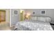 A simple, yet cozy bedroom with an ensuite bathroom at 7742 Whitebridge Gln, University Park, FL 34201
