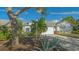 Well-maintained single-Gathering home with a paver walkway, two car garage, and mature landscaping at 7742 Whitebridge Gln, University Park, FL 34201