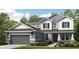Charming two-story home with gray and white accents, two-car garage and landscaped yard at 9128 Radiant Cir, Sarasota, FL 34241