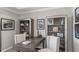 Charming office space with wood desk, shelving, and stylish decor at 9128 Radiant Cir, Sarasota, FL 34241
