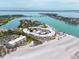 Breathtaking aerial view of a waterfront community, showcasing the unique island living experience at 100 Sands Point Rd # 225, Longboat Key, FL 34228