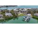 A circular condo complex with private docks and waterfront views at 100 Sands Point Rd # 225, Longboat Key, FL 34228