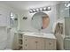 Elegant bathroom with modern vanity, granite countertop, and glass-enclosed shower at 100 Sands Point Rd # 225, Longboat Key, FL 34228