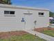 Exterior view of a storage building for bicycles at the complex at 100 Sands Point Rd # 225, Longboat Key, FL 34228