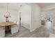An open-concept layout with a clear view from the dinette through the kitchen to the Gathering area at 12130 Seabrook Ave, Bradenton, FL 34211