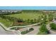 Expansive community park featuring baseball field, soccer nets, landscaped grounds and a walking trail at 12130 Seabrook Ave, Bradenton, FL 34211