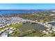 Gorgeous aerial shot of a lakeside community with neatly arranged homes surrounded by picturesque waterfront scenery at 1224 41St Avenue E Dr, Ellenton, FL 34222