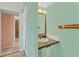Bathroom featuring neutral walls and a view of a shower and sink at 1224 41St Avenue E Dr, Ellenton, FL 34222