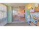 Inviting Florida room featuring a sliding door that opens to the living area at 1224 41St Avenue E Dr, Ellenton, FL 34222