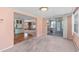 Open living area featuring a blend of hardwood floors and carpeting at 1224 41St Avenue E Dr, Ellenton, FL 34222
