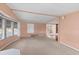 Inviting living room with neutral carpet, natural light, and ample space at 1224 41St Avenue E Dr, Ellenton, FL 34222