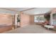 Comfortable living room featuring hardwood floors and seamless flow into the kitchen at 1224 41St Avenue E Dr, Ellenton, FL 34222