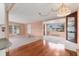 Bright living space with hardwood floors and large windows offering ample natural light at 1224 41St Avenue E Dr, Ellenton, FL 34222