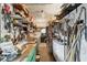 Organized workshop filled with tools and supplies, featuring ample storage space and workbench areas at 1224 41St Avenue E Dr, Ellenton, FL 34222