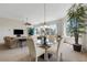 Inviting dining area with a glass table and ample seating at 1311 Triano Cir # 1311, Venice, FL 34292