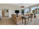 Living area showcases a media center and a large window for natural light and garden views at 1311 Triano Cir # 1311, Venice, FL 34292