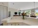 Open-concept living area with plenty of natural light and comfortable furnishings at 1311 Triano Cir # 1311, Venice, FL 34292