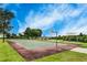 View of the community basketball court with playground and covered picnic area at 14616 20Th E St, Parrish, FL 34219