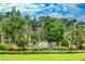 Stone entrance to the Twin Rivers community, beautifully landscaped at 14616 20Th E St, Parrish, FL 34219