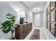 Entryway featuring modern decor, tile floors, and natural light at 14616 20Th E St, Parrish, FL 34219