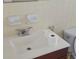 Standard bathroom featuring a sink, toilet, and tiled backsplash at 1778 23Rd St, Sarasota, FL 34234