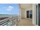 Relax on this beautiful balcony with stunning ocean views and a lovely white decorative railing at 2050 Benjamin Franklin Dr # A1001, Sarasota, FL 34236