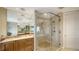 Spacious bathroom featuring a modern glass enclosed shower and ample counter space at 2050 Benjamin Franklin Dr # A1001, Sarasota, FL 34236