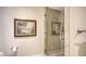 Modern bathroom features a glass-enclosed shower with contemporary tile work at 2050 Benjamin Franklin Dr # A1001, Sarasota, FL 34236