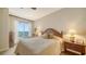 Comfortable bedroom featuring a serene view and a cozy, inviting interior design with water views at 2050 Benjamin Franklin Dr # A1001, Sarasota, FL 34236