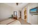 Comfortable bedroom showcasing a built-in TV and convenient access to the ensuite at 2050 Benjamin Franklin Dr # A1001, Sarasota, FL 34236