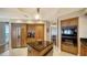 Modern kitchen featuring stainless steel appliances, granite counters, and an island at 2050 Benjamin Franklin Dr # A1001, Sarasota, FL 34236