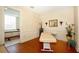 Relaxing spa room with massage table, decorative touches, and adjacent soaking tub at 2050 Benjamin Franklin Dr # A1001, Sarasota, FL 34236