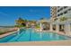 Outdoor pool with beach access and ample lounging areas with stunning views of the ocean and tropical landscape at 2050 Benjamin Franklin Dr # A1001, Sarasota, FL 34236