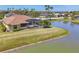 Picture of an appealing property featuring a screened-in pool and picturesque water views at 2281 Vintage St, Sarasota, FL 34240
