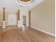 Inviting living room featuring elegant columns and double-door entrance, perfect for entertaining and comfortable living at 2281 Vintage St, Sarasota, FL 34240