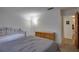 Comfortable bedroom with two beds and carpet flooring at 2505 Beneva Rd # 3, Sarasota, FL 34232