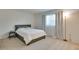 Neutral bedroom with a comfortable bed and carpet flooring at 2505 Beneva Rd # 3, Sarasota, FL 34232