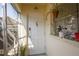 Apartment entrance with a decorative door and lush plants at 2505 Beneva Rd # 3, Sarasota, FL 34232