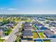 Aerial view of a charming neighborhood with well-maintained homes and lush greenery at 3503 14Th E Ct, Ellenton, FL 34222
