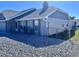 Charming single-story home with a well-maintained exterior, gray stucco, and a neatly graveled front yard at 3608 67Th Street Ct W, Bradenton, FL 34209
