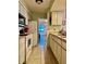 Functional kitchen with white appliances and cabinets, offering a clean and efficient space at 3608 67Th Street Ct W, Bradenton, FL 34209