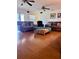 Bright living room with hardwood floors, plush couches and natural light. Perfect for gatherings at 3608 67Th Street Ct W, Bradenton, FL 34209