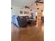Comfortable living room with hardwood floors, ceiling fans and plush couches for a cozy retreat at 3608 67Th Street Ct W, Bradenton, FL 34209