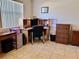 Bright office space featuring ample natural light, neutral walls, and an efficient work area at 3608 67Th Street Ct W, Bradenton, FL 34209