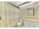 Cozy bathroom featuring a shower/tub combo and white vanity with marble-style countertops at 4091 Center Pointe Pl # 40A, Sarasota, FL 34233