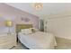 Inviting bedroom featuring a comfortable bed, elegant decor, and ample closet space at 4091 Center Pointe Pl # 40A, Sarasota, FL 34233