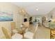 Open floor plan featuring a dining area, living room, and sliding door access to the outside at 4091 Center Pointe Pl # 40A, Sarasota, FL 34233